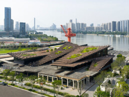 kengo kuma guangzhou astilleros rio perla arquitectura moderna piedra volcánica